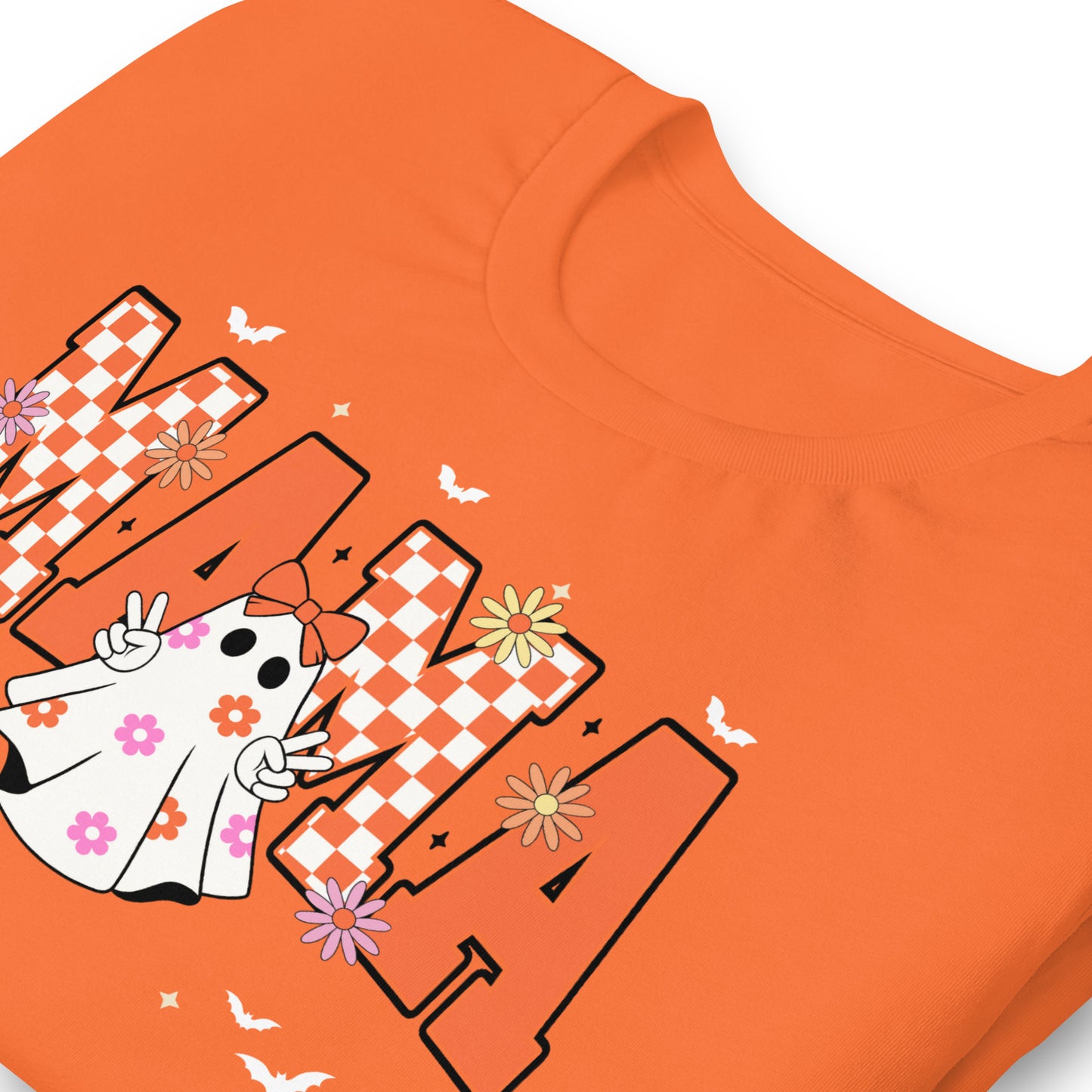 Folded Groovy Momma Halloween tee in orange with ghost and lightning bolt graphic – women’s retro Halloween shirt