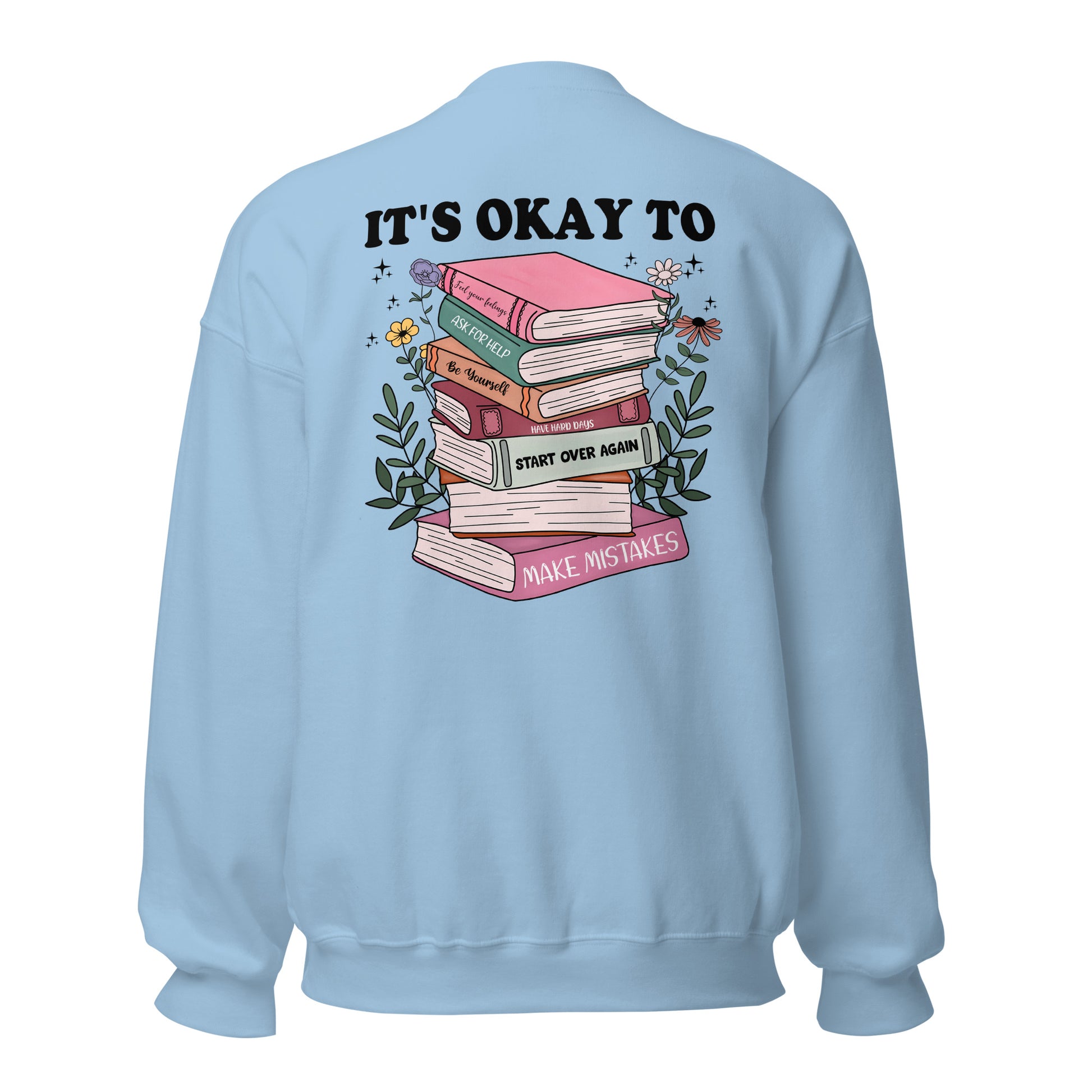 Light blue, "it's Okay" sweatshirt with a graphic design of books and text on the back, on a white background.