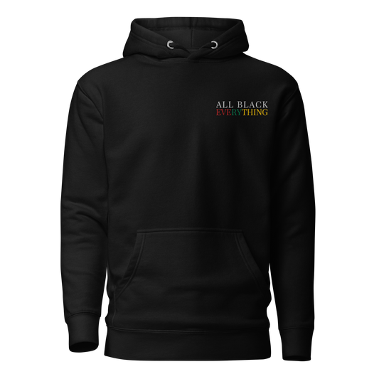 All black unisex cotton hoodie with embroidered text All Black in white thread, everything in red, green and yellow on a white background.  