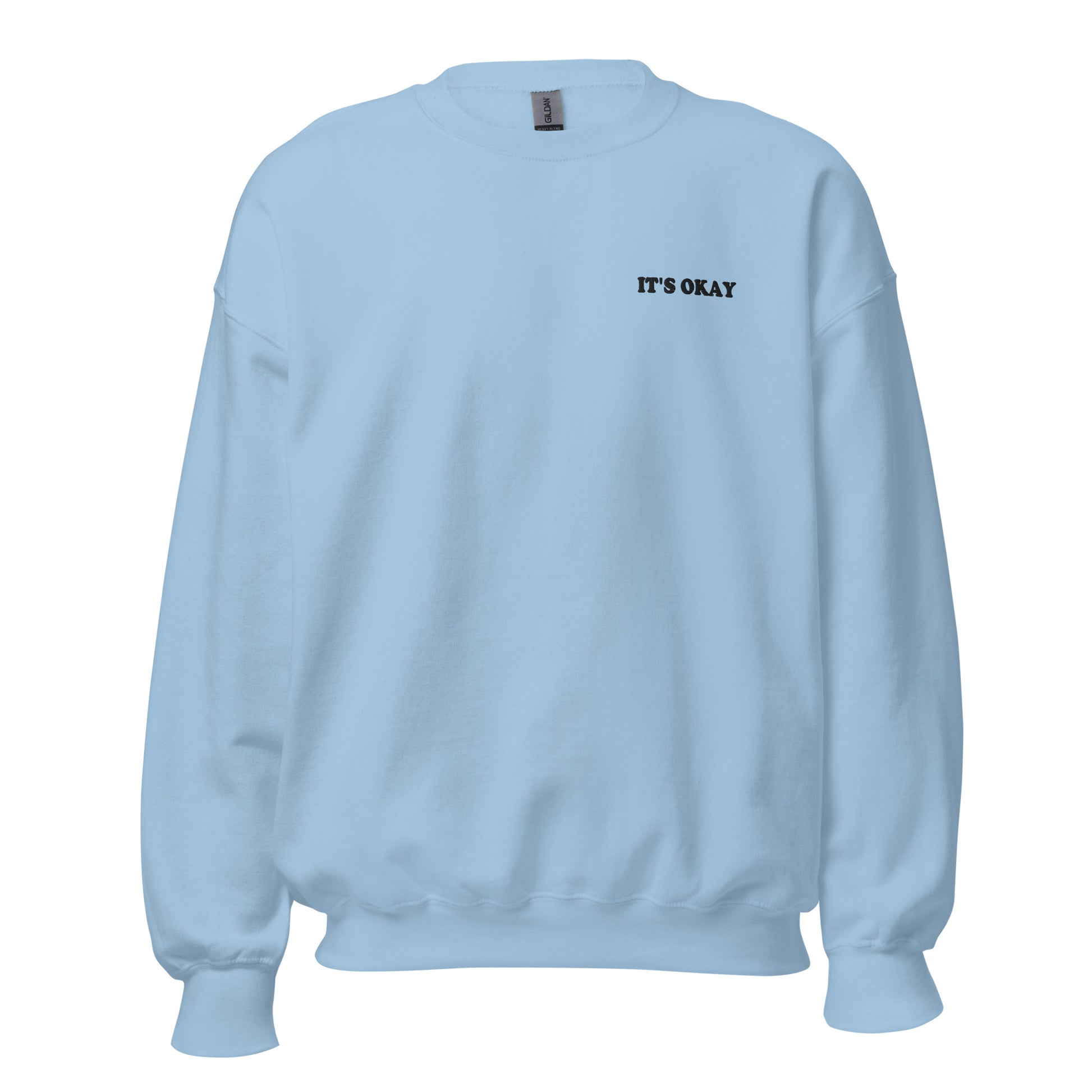Light blue sweatshirt with 'IT'S OKAY' embroidered text on a white background